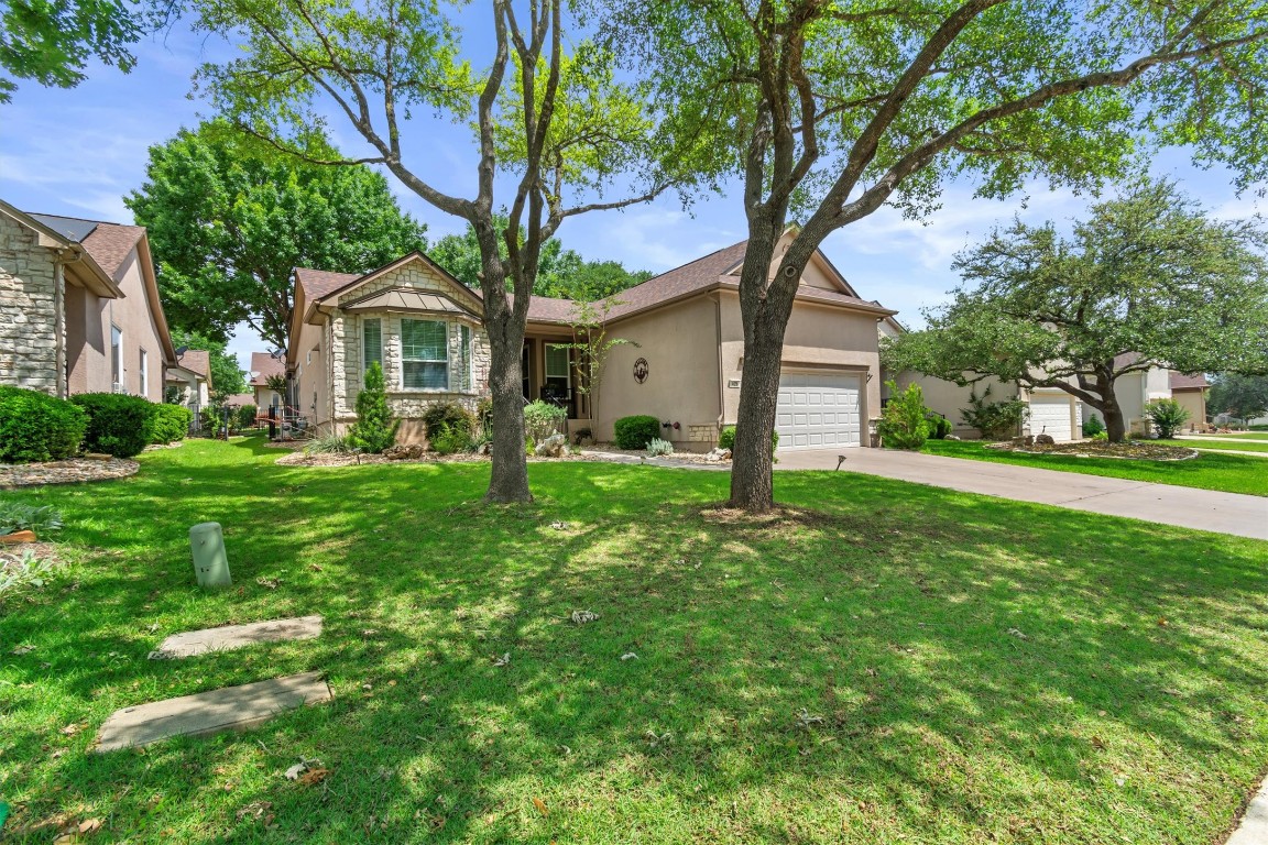 409 Rio Grande Loop Georgetown, TX 78633 - Photo 1 of 38 a front view of house with yard and green space