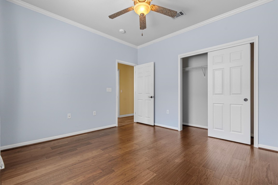 409 Rio Grande Loop Georgetown, TX 78633 - Photo 14 of 38 a view of an empty room with wooden floor