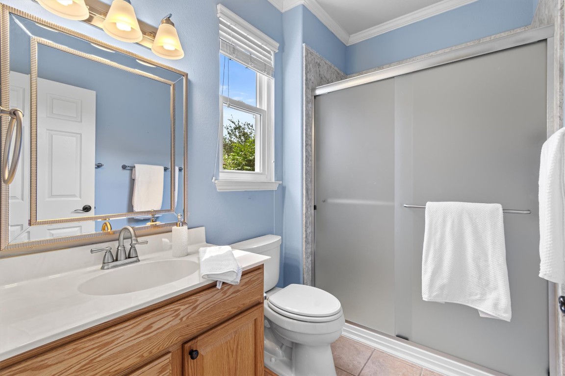 409 Rio Grande Loop Georgetown, TX 78633 - Photo 16 of 38 a bathroom with a sink toilet and shower