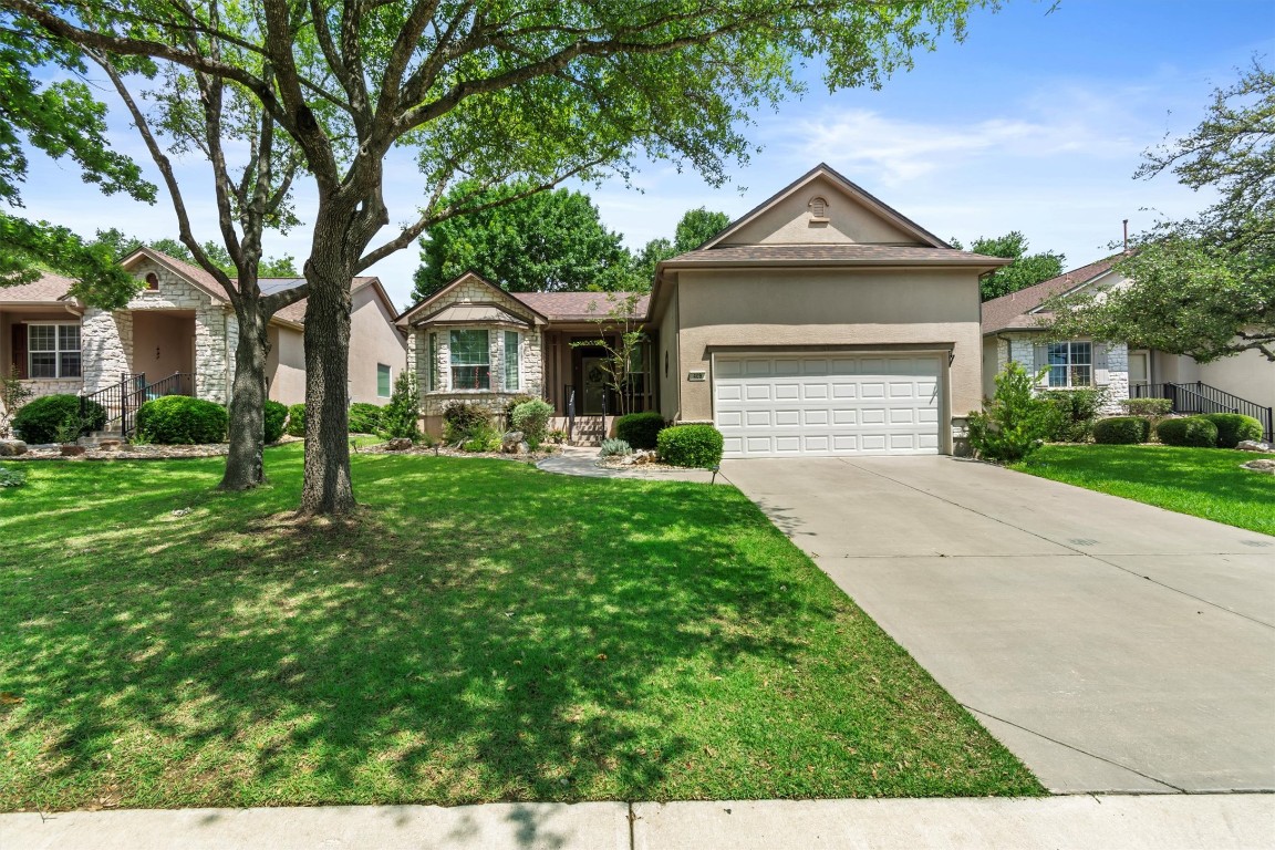 409 Rio Grande Loop Georgetown, TX 78633 - Photo 29 of 38 a front view of a house with a yard and garage