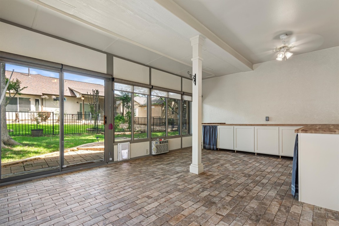 409 Rio Grande Loop Georgetown, TX 78633 - Photo 4 of 38 a view of empty room with wooden floor and fan