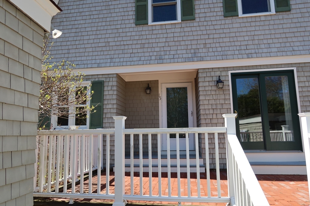 74 Branch Street, Unit 15 Scituate, MA 02066 - Photo 2 of 26 a view of a brick house with many windows