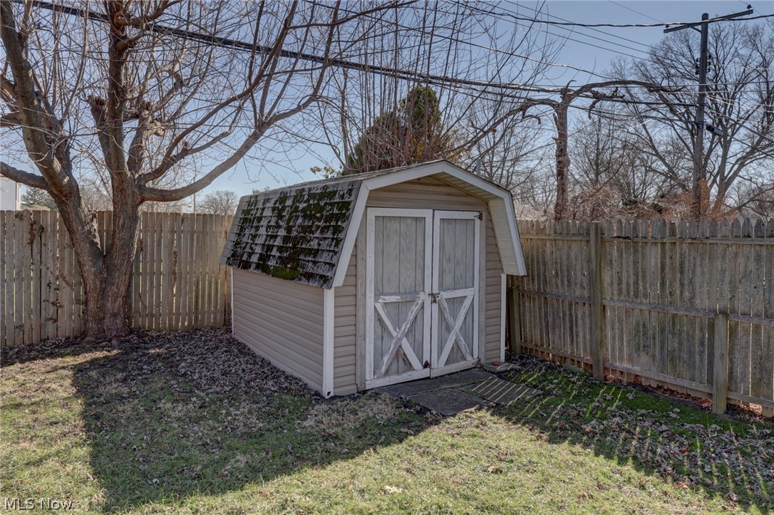 189 Harcourt Road Vermilion, OH 44089 - Photo 26 of 36 View of shed with a fenced backyard