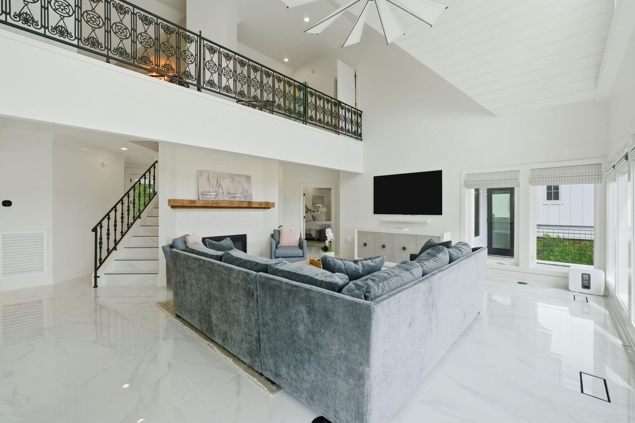 31061 Peninsula Drive Orange Beach, AL 36561 - Photo 37 of 93 a living room with furniture and a flat screen tv