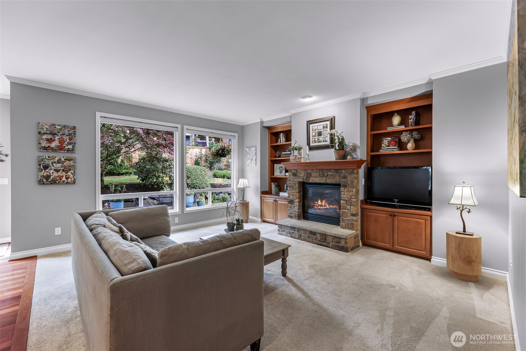 2029 240th Place Southeast Bothell, WA 98021 - Photo 18 of 39 a living room with furniture and a fireplace