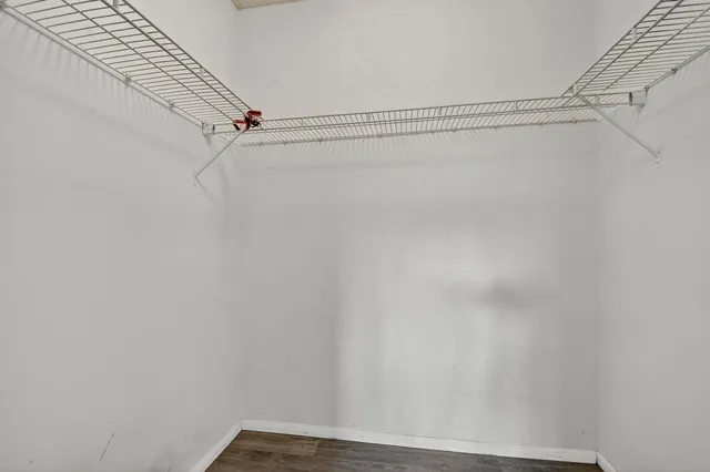 a view of a room with racks on the wall