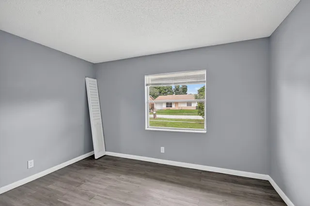 an empty room with window