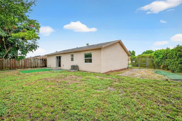 a view of a backyard with a garden