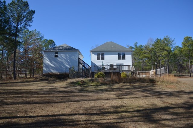 199 Orchard Ridge Drive Forsyth, GA 31029 - Photo 16 of 21 a front view of a house with a yard