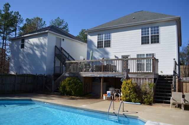 199 Orchard Ridge Drive Forsyth, GA 31029 - Photo 20 of 21 a view of a house with wooden deck