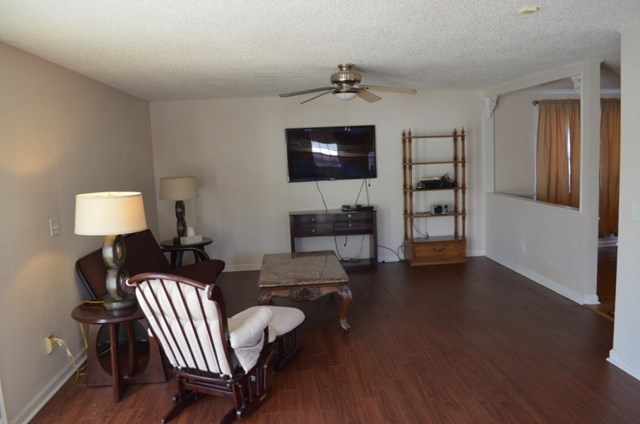 199 Orchard Ridge Drive Forsyth, GA 31029 - Photo 5 of 21 a living room with furniture and a wooden floor