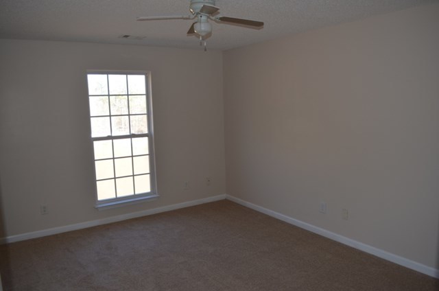 199 Orchard Ridge Drive Forsyth, GA 31029 - Photo 9 of 21 an empty room with a window