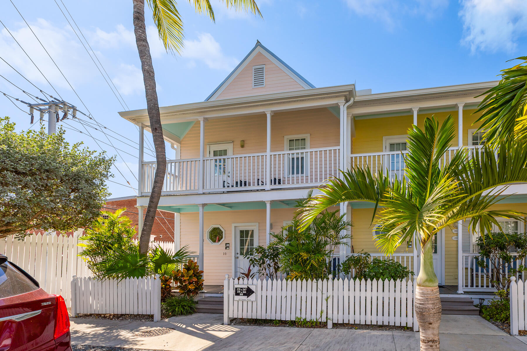 620 Thomas Street, Unit 175 Key West, FL 33040 - Photo 3 of 30 a front view of a house with a garden