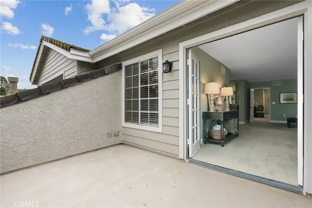 a bathroom with double vanity sinks and a shower
