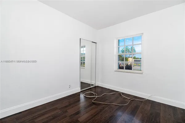 a kitchen with stainless steel appliances granite countertop a stove and a microwave
