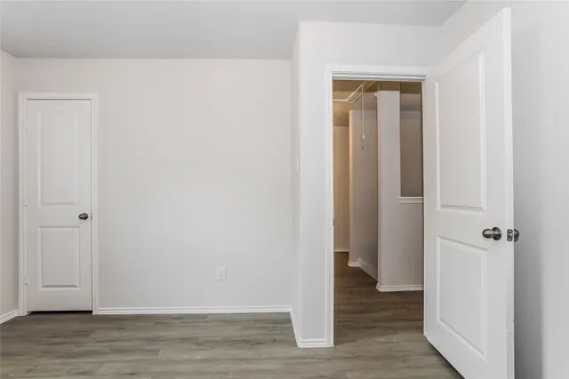 a view of a livingroom with wooden floor