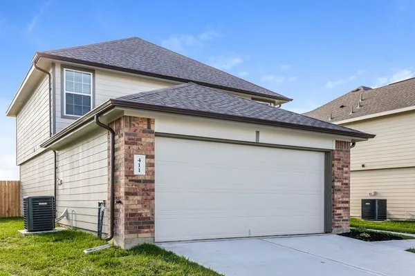 a view of a house with garage