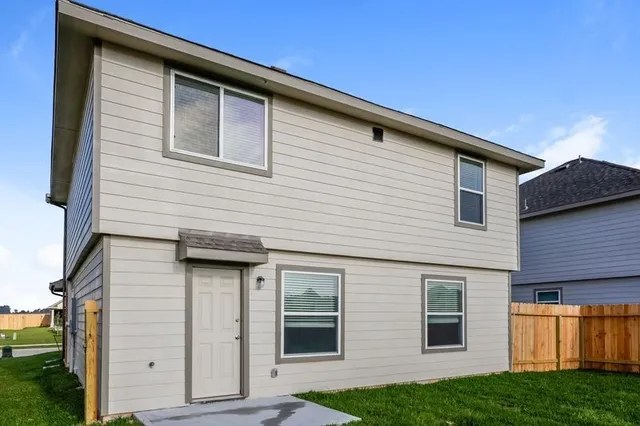 a house that has a window in front of it