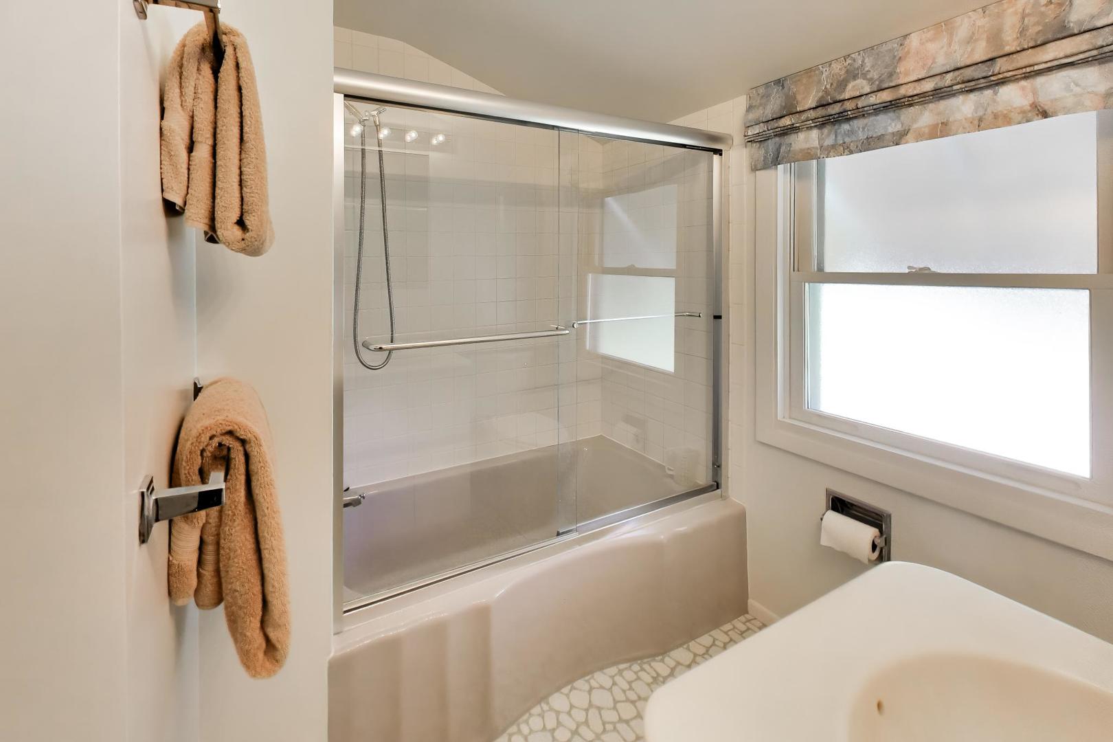 103 Cottonwood Road Northbrook, IL 60062 - Photo 34 of 50 a bathroom with a tub and a shower