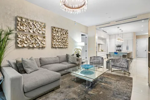 a living room with furniture and flat screen tv