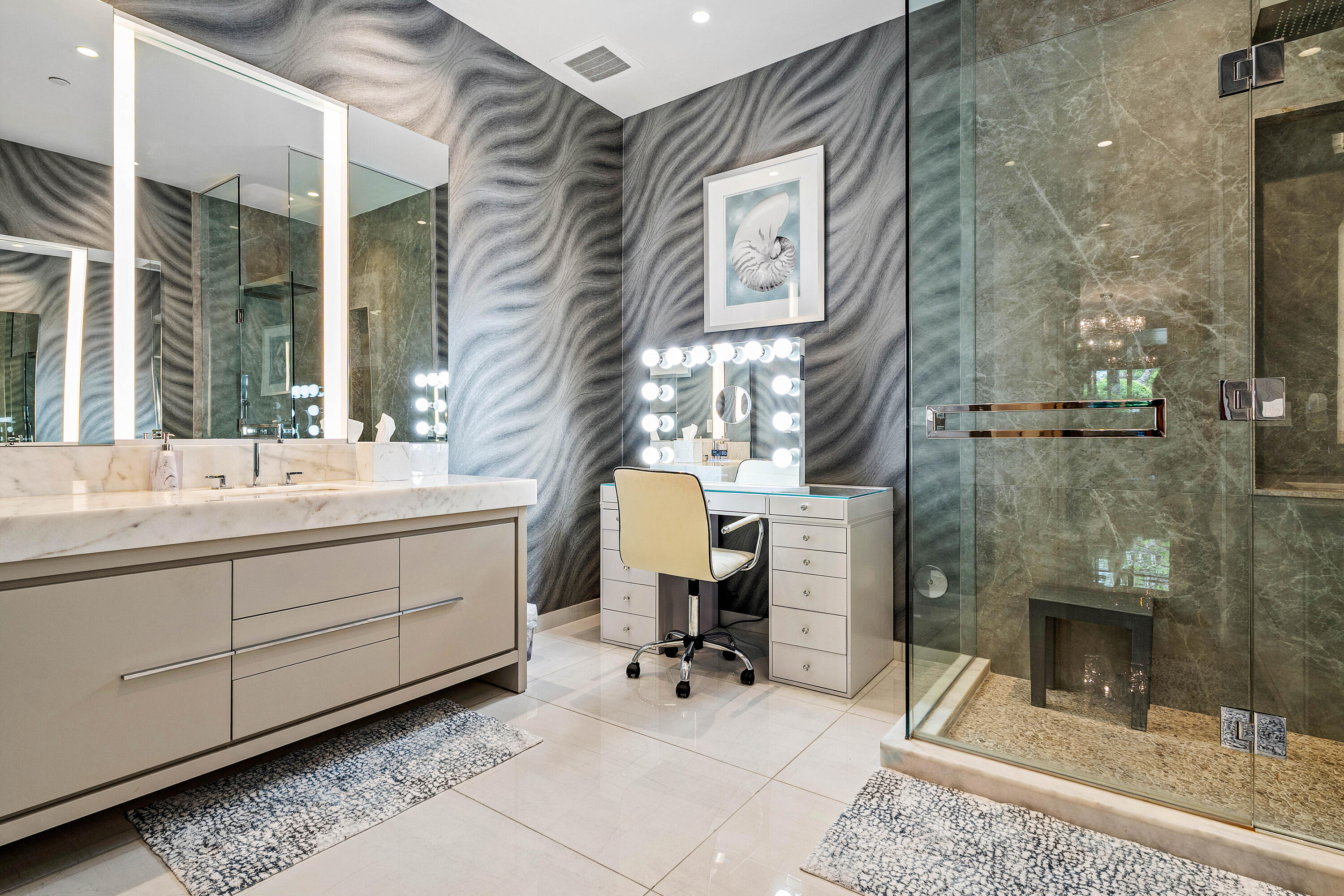 200 Southeast Mizner Boulevard, Unit 104 Boca Raton, FL 33432 - Photo 17 of 82 a bathroom with a sink and a mirror