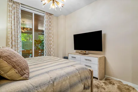 a view of a patio with couches and chairs