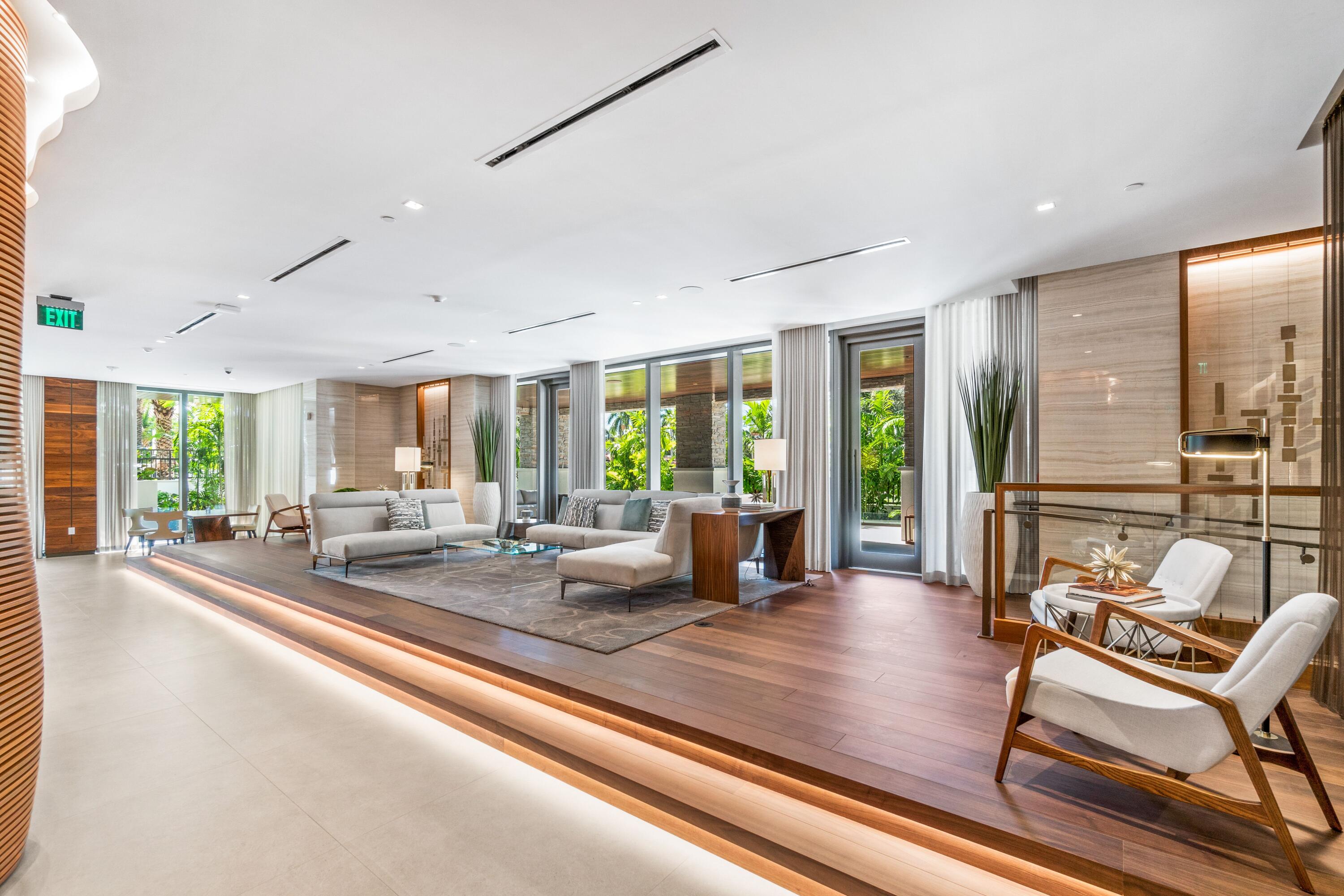 200 Southeast Mizner Boulevard, Unit 104 Boca Raton, FL 33432 - Photo 31 of 82 a view of a living room and floor to ceiling window or kitchen