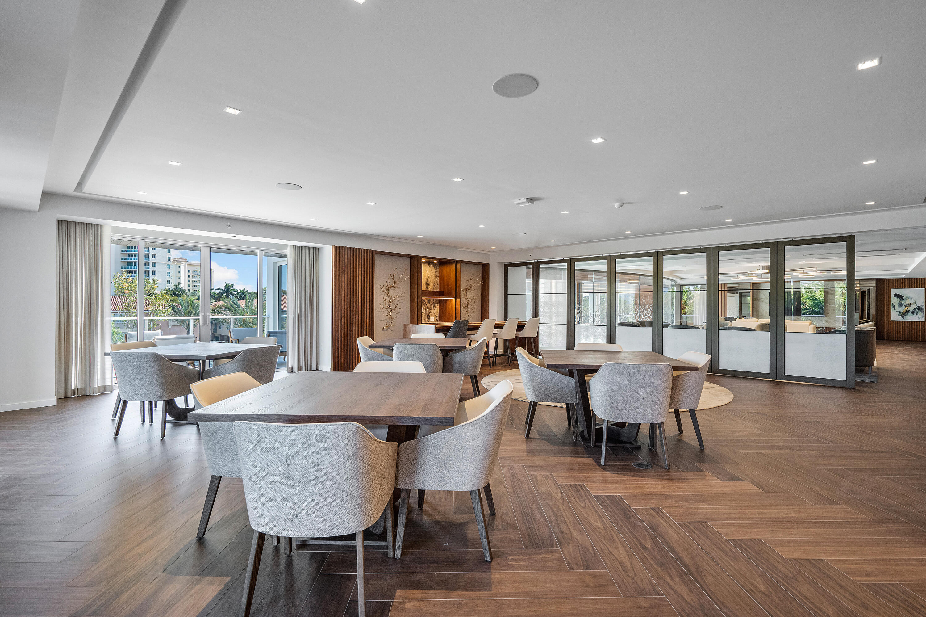 200 Southeast Mizner Boulevard, Unit 104 Boca Raton, FL 33432 - Photo 65 of 82 a view of a dining room with furniture window and wooden floor