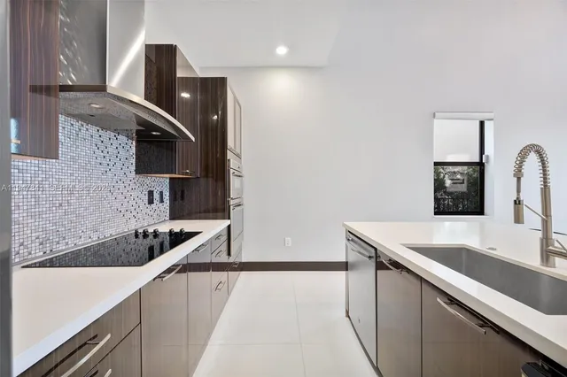 a view of a hallway with seating area