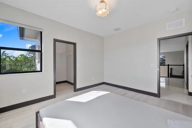 an empty room with windows