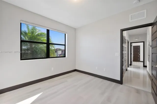 a view of a room with a yard