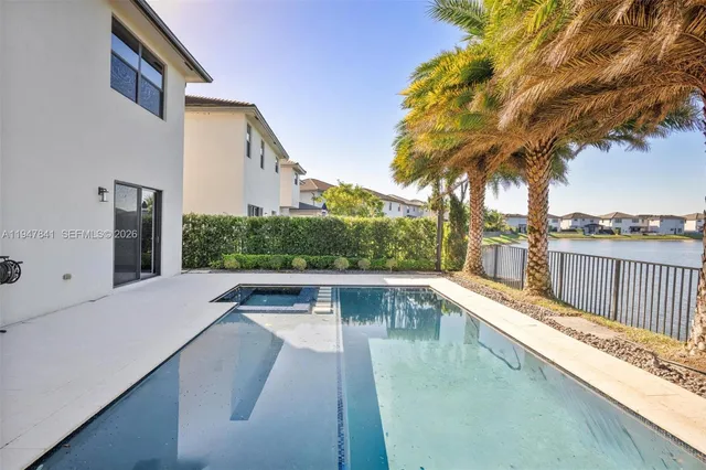 a view of a house with a swimming pool