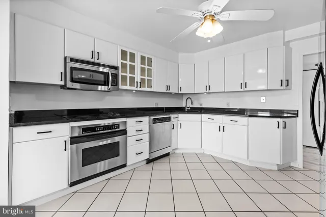 a view of a livingroom with a kitchen