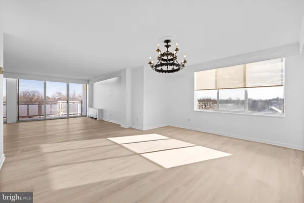 an empty room with windows