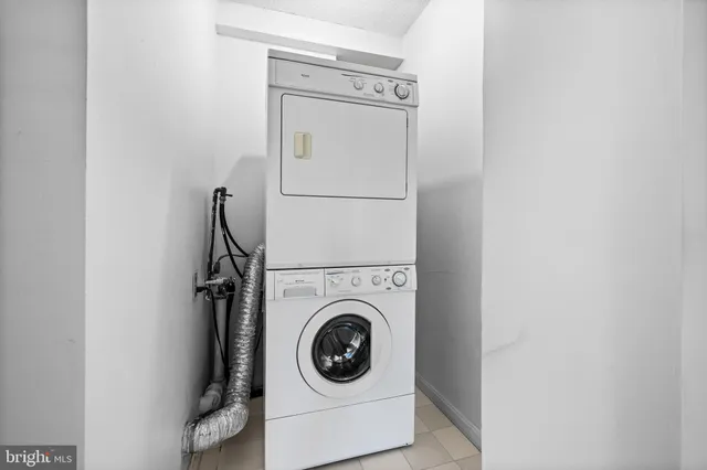 a view of a walk in closet and city view