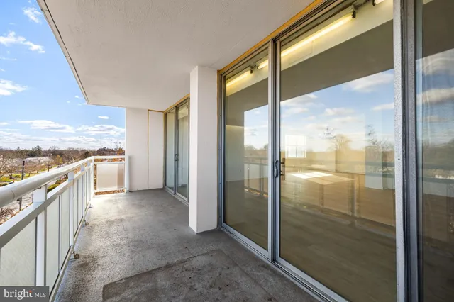 a view of a bathroom with a glass door