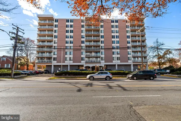 a view of a cars parked in front of a building