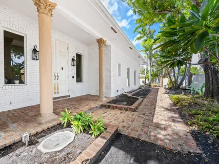 a view of a house with swimming pool
