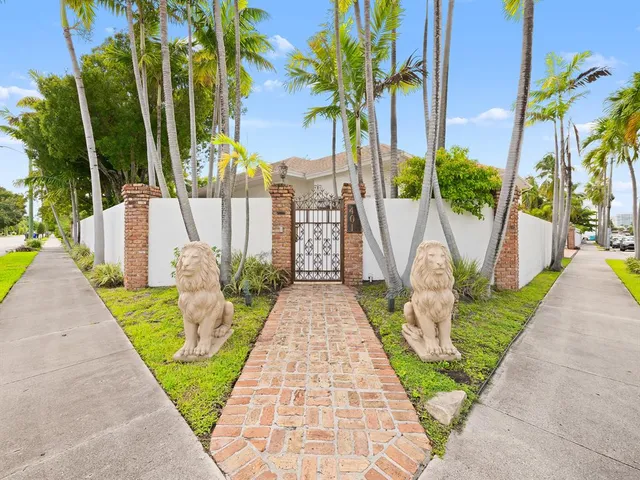 a view of a porch and garden