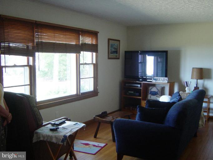 6115 Twin Point Cove Road Cambridge, MD 21613 - Photo 13 of 28 Living room with water view