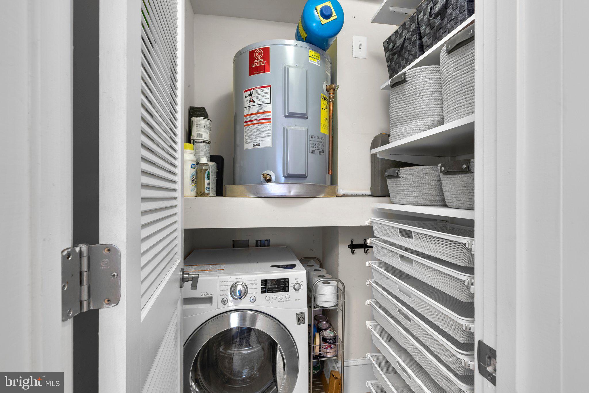 1451 Park Road Northwest, Unit 104 Washington, DC 20010 - Photo 12 of 28 a utility room with dryer and washer