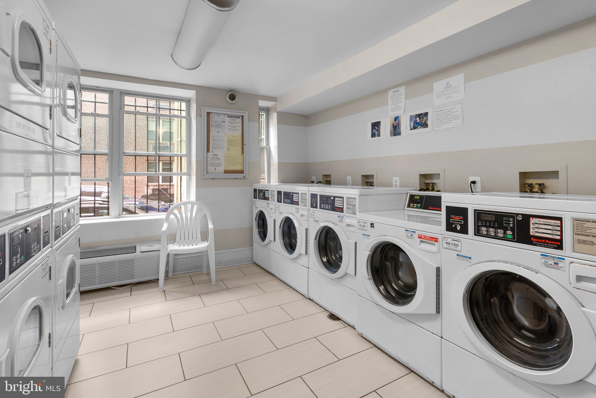 1451 Park Road Northwest, Unit 104 Washington, DC 20010 - Photo 15 of 28 a utility room with dryer and washer