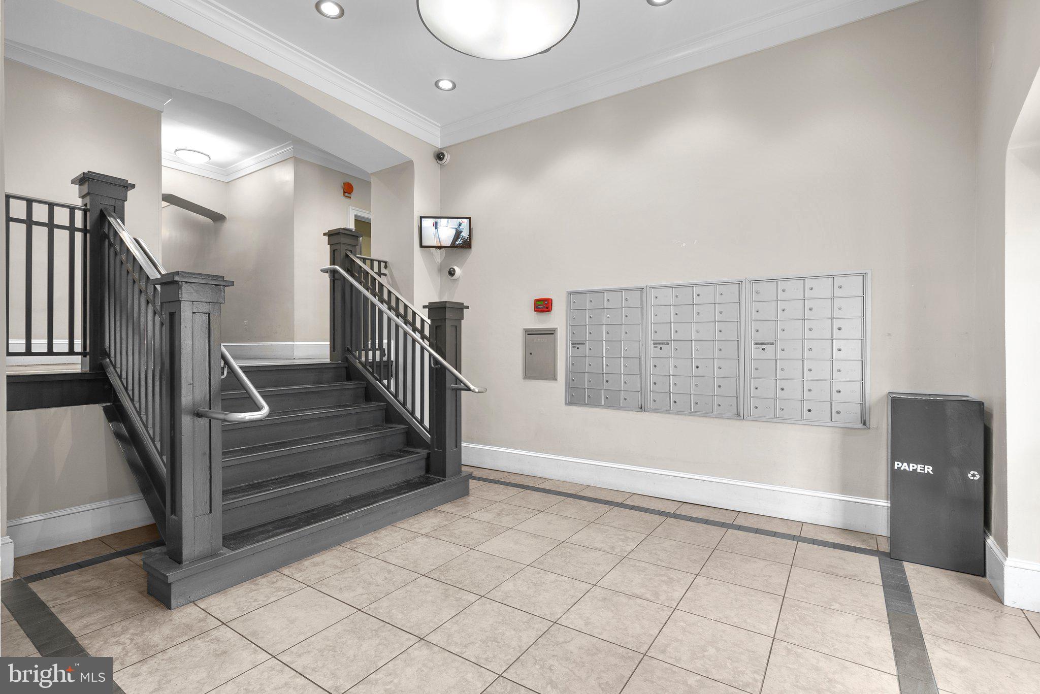 1451 Park Road Northwest, Unit 104 Washington, DC 20010 - Photo 2 of 28 a bathroom with a bathtub and a shower