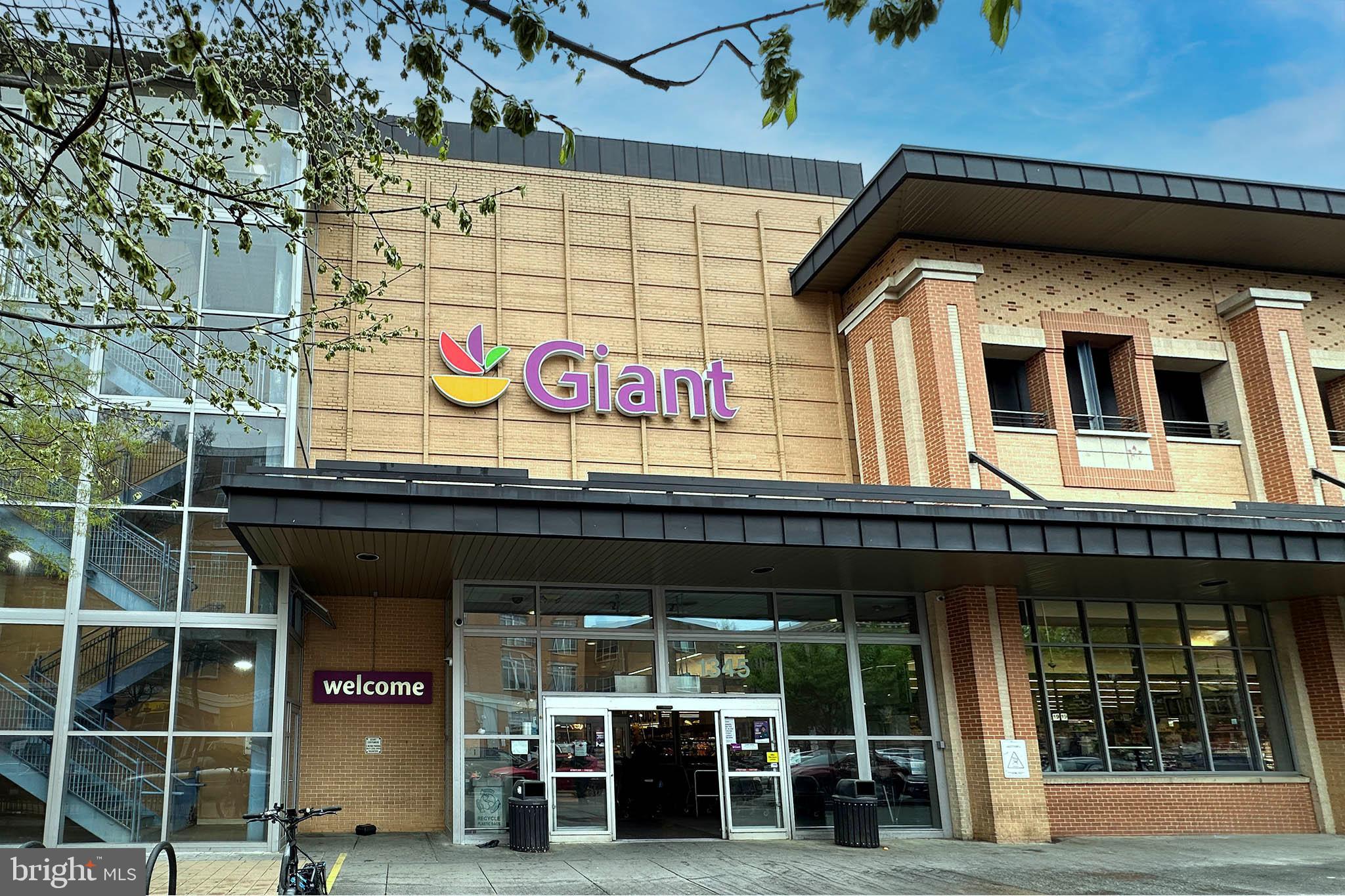 1451 Park Road Northwest, Unit 104 Washington, DC 20010 - Photo 20 of 28 a front view of a building with the porch