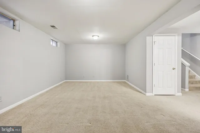 an empty room with a natural light