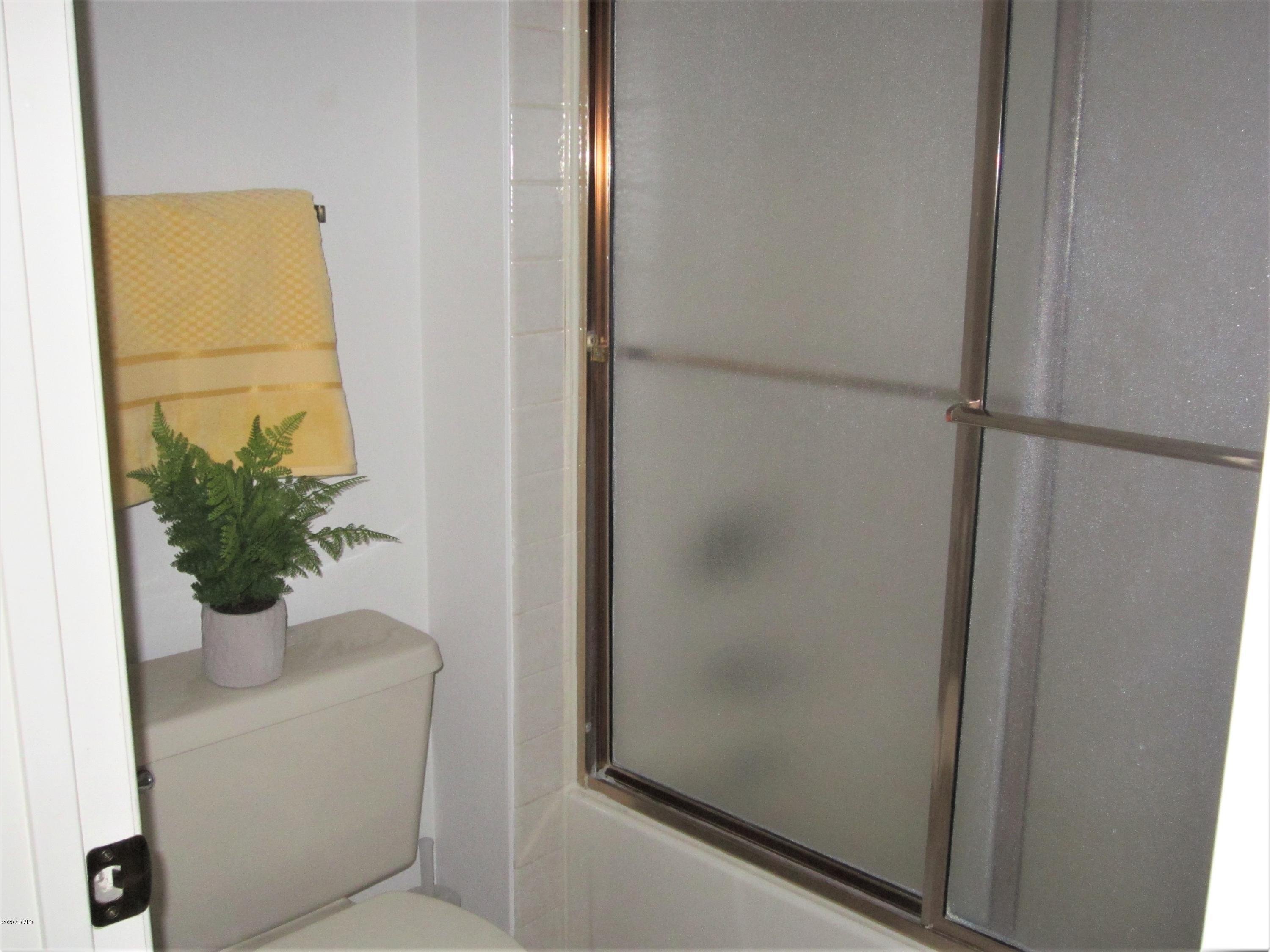 4303 East Cactus Road, Unit 406 Phoenix, AZ 85032 - Photo 6 of 27 B10 U406 BATHROOM TUB SHOWER COMBO - Cop