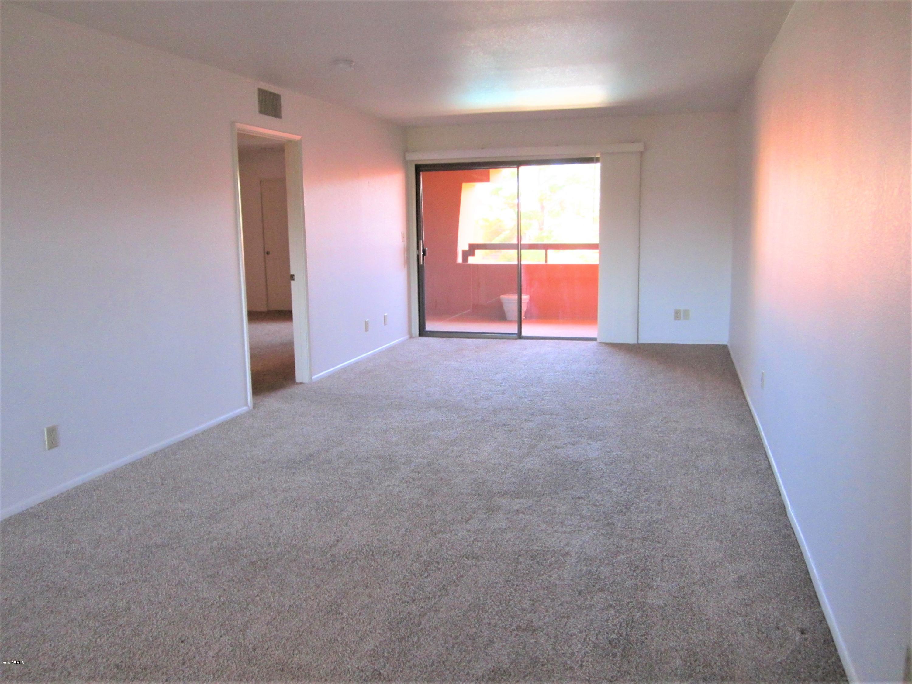 4303 East Cactus Road, Unit 406 Phoenix, AZ 85032 - Photo 7 of 27 B7-406 VIEW TOWARD BALCONY