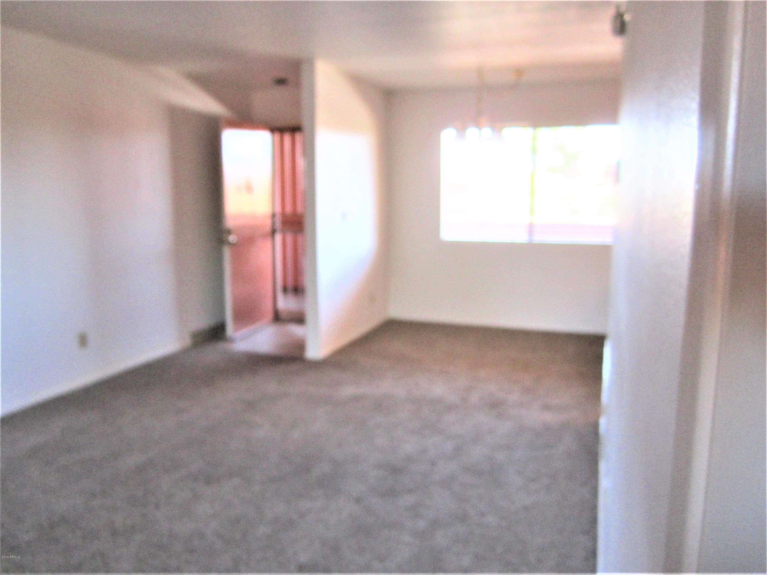 4303 East Cactus Road, Unit 406 Phoenix, AZ 85032 - Photo 8 of 27 B7-406 SECURITY ENTRY DOOR