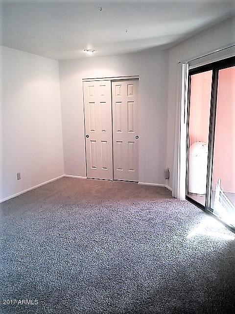4303 East Cactus Road, Unit 406 Phoenix, AZ 85032 - Photo 10 of 27 COMFORTABLE BEDROOM