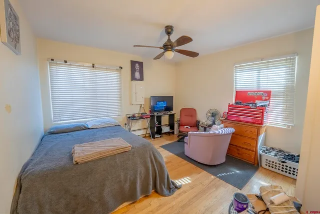 a bathroom with a shower curtain and a curtain